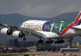 Emirates Airbus A380, with Wimbledon livery, landing in Barcelona