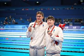 Paris 2024 Paralympics - Para Swimming - Alex Portal and Kylian Portal on the 400m freestyle podium