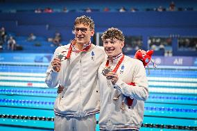 Paris 2024 Paralympics - Para Swimming - Alex Portal and Kylian Portal on the 400m freestyle podium