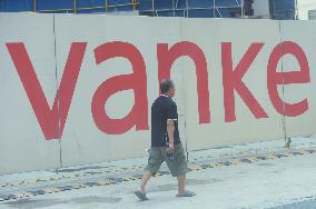 Vanke Incurs Losses