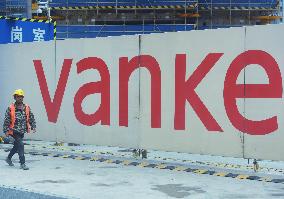 Vanke Incurs Losses