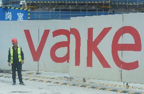 Vanke Incurs Losses