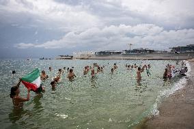 The "Swim With Gaza" Initiative On The Beach Of Barcelona.