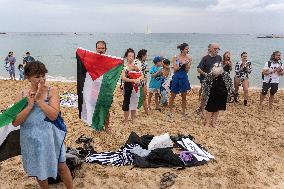 The "Swim With Gaza" Initiative On The Beach Of Barcelona.