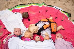 The "Swim With Gaza" Initiative On The Beach Of Barcelona.