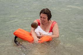 The "Swim With Gaza" Initiative On The Beach Of Barcelona.