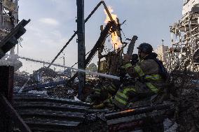 Firefighters work in Kharkiv