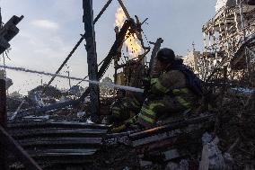 Firefighters work in Kharkiv