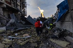 Firefighters work in Kharkiv