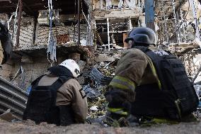 Firefighters work in Kharkiv