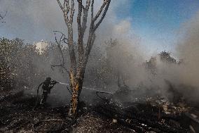 Firefighters work in Kharkiv