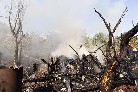 Firefighters work in Kharkiv