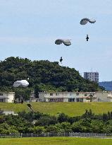 Parachuting drill at U.S. Air Force base in Okinawa