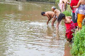 Hindu Devotees Offering Ritual On Father's Day In Bhaktapur, Nepal.