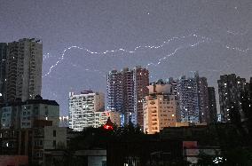 A Lightning Bolt Strikes The Sky Over Korla