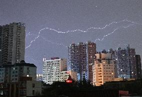 A Lightning Bolt Strikes The Sky Over Korla