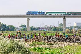 Workers Unload Earth From Meghna River - Dhaka