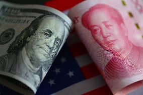 U.S. Dollar And Chinese Yuan Banknotes