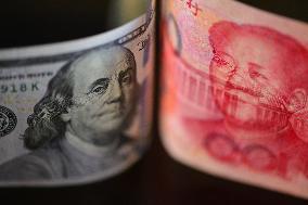 U.S. Dollar And Chinese Yuan Banknotes