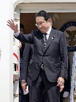 Japan PM Kishida leaves for South Korea