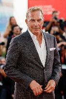 81st Mostra - Sienna Miller And Kevin Costner Walk The Red Carpet