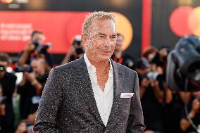 81st Mostra - Sienna Miller And Kevin Costner Walk The Red Carpet