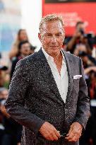 81st Mostra - Sienna Miller And Kevin Costner Walk The Red Carpet