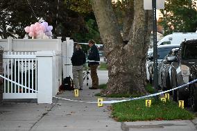 Crime Scene Investigators At The Scene Where Three People Were Shot At 132-45 220th Street In Queens New York