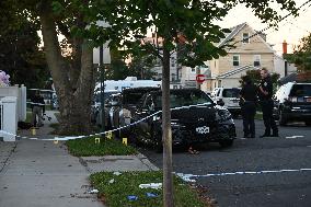 Crime Scene Investigators At The Scene Where Three People Were Shot At 132-45 220th Street In Queens New York