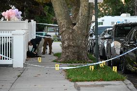 Crime Scene Investigators At The Scene Where Three People Were Shot At 132-45 220th Street In Queens New York