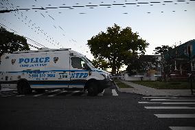 Crime Scene Investigators At The Scene Where Three People Were Shot At 132-45 220th Street In Queens New York