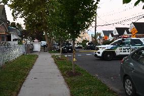 Crime Scene Investigators At The Scene Where Three People Were Shot At 132-45 220th Street In Queens New York