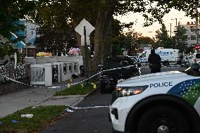 Crime Scene Investigators At The Scene Where Three People Were Shot At 132-45 220th Street In Queens New York