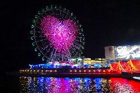 Rainbow Bridge and Ferris Wheel Night View in Qingdao