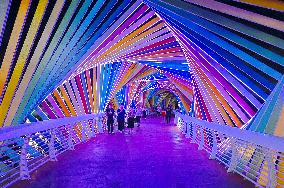 Rainbow Bridge and Ferris Wheel Night View in Qingdao