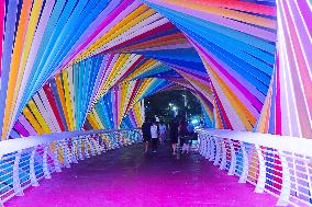 Rainbow Bridge and Ferris Wheel Night View in Qingdao