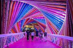 Rainbow Bridge and Ferris Wheel Night View in Qingdao