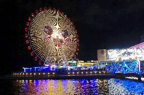 Rainbow Bridge and Ferris Wheel Night View in Qingdao