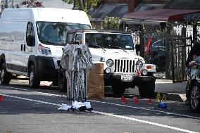 Crime Scene Investigators Investigate The Scene Of A 46-year-old Male Was Shot Multiple Times And Killed In Bronx New York