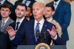 US President Joe Biden welcomes the University of Connecticut Huskies Mens Basketball team to the White House