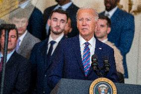 US President Joe Biden welcomes the University of Connecticut Huskies Mens Basketball team to the White House