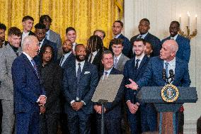 US President Joe Biden welcomes the University of Connecticut Huskies Mens Basketball team to the White House