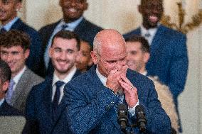 US President Joe Biden welcomes the University of Connecticut Huskies Mens Basketball team to the White House