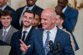 US President Joe Biden welcomes the University of Connecticut Huskies Mens Basketball team to the White House