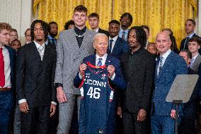 US President Joe Biden welcomes the University of Connecticut Huskies Mens Basketball team to the White House