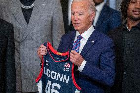 US President Joe Biden welcomes the University of Connecticut Huskies Mens Basketball team to the White House