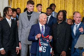 US President Joe Biden welcomes the University of Connecticut Huskies Mens Basketball team to the White House