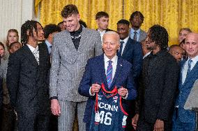 US President Joe Biden welcomes the University of Connecticut Huskies Mens Basketball team to the White House