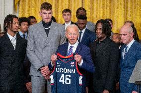 US President Joe Biden welcomes the University of Connecticut Huskies Mens Basketball team to the White House