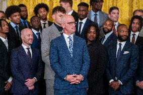 US President Joe Biden welcomes the University of Connecticut Huskies Mens Basketball team to the White House